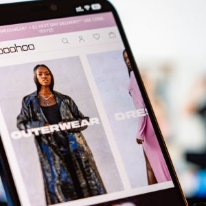 BooHoo Mobile Website with laptop website in the background