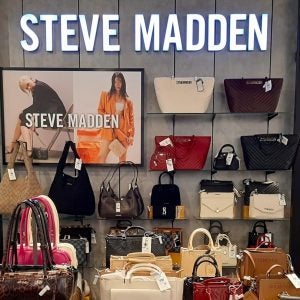 Steve Madden shop display of handbags and clothing in a department store in Lima, Peru